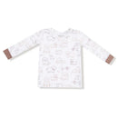 Long sleeve loungewear set featuring a playful pattern of various dog illustrations on a white background.