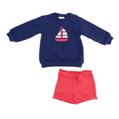 Oversized navy sweatshirt with sailboat applique, paired with coral paperbag shorts, suitable for babies.