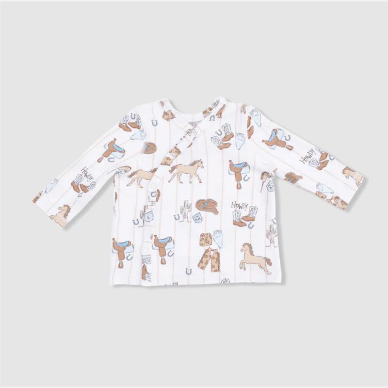 Convertible pant set featuring cowboy-themed patterns, including horses and western gear on a light background.