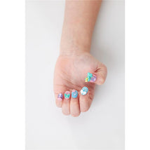 Colorful painted nails featuring unicorn and star designs, showcasing the Aquabeads - Stars & Unicorn Nail Refill Kit.