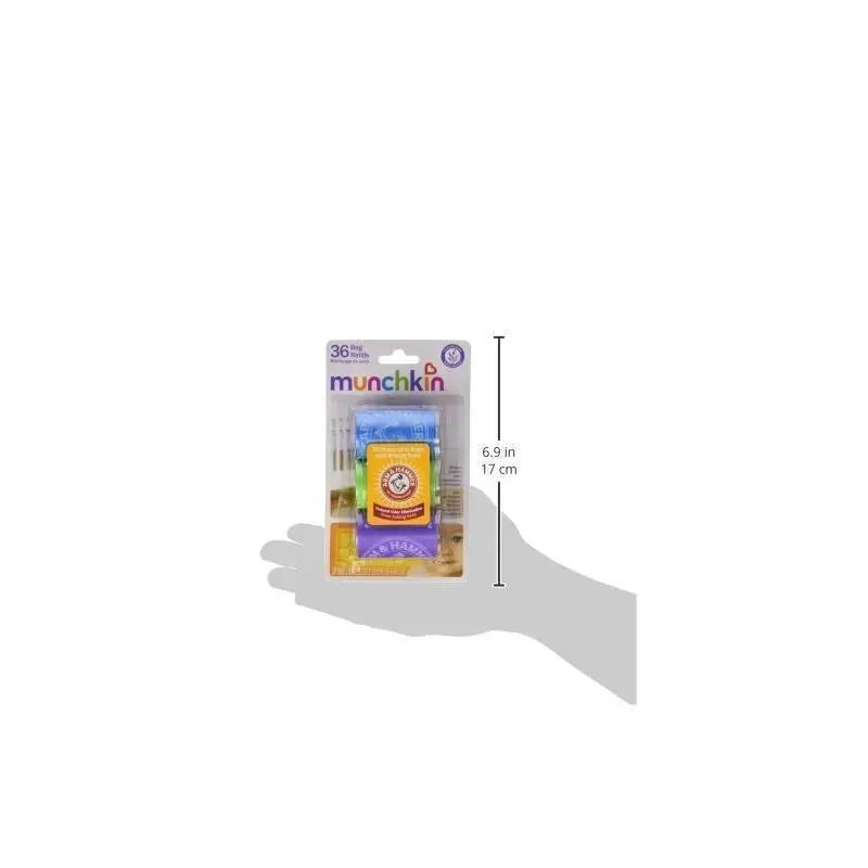 Munchkin Arm & Hammer Dog Waste Bags 6-pack with 36 bags total, featuring colorful packaging and a hand silhouette for size reference.