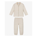 Beige two-piece tracksuit for baby boys, featuring a zip-up jacket and matching pants with front pockets.