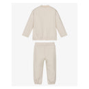 Beige tracksuit for baby boys featuring a long-sleeve top and matching pants with elastic cuffs.