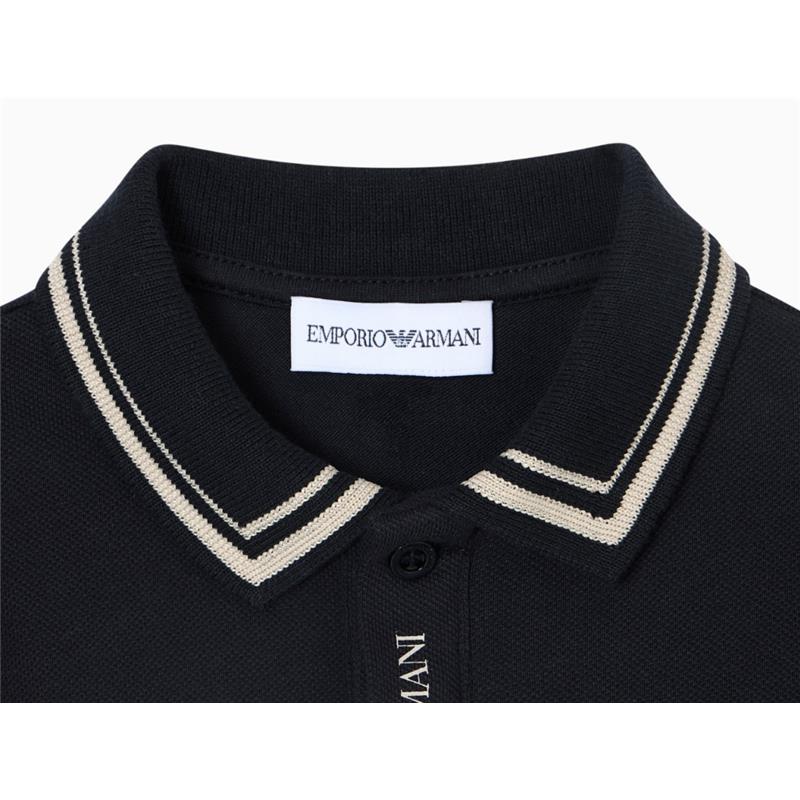 Navy short sleeve polo shirt for baby boys featuring a contrast piped collar and embroidered Emporio Armani logo.