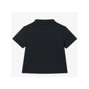 Boys short sleeve polo shirt in navy with a collar and a plain back design.