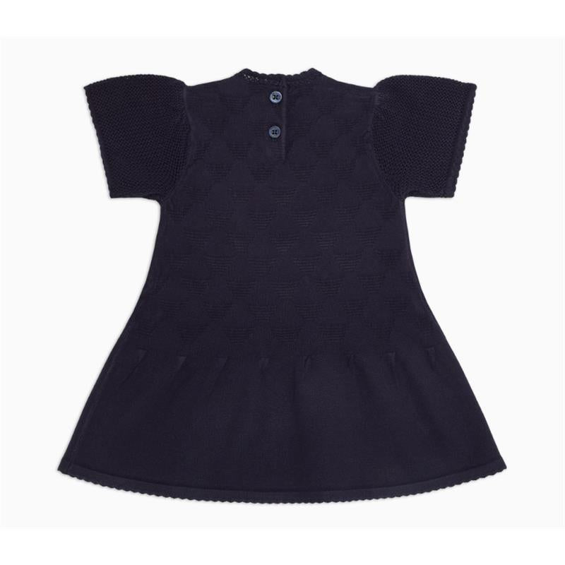 Navy flared dress for babies made of all-over eagle jacquard knit, featuring short sleeves and buttoned back closure.
