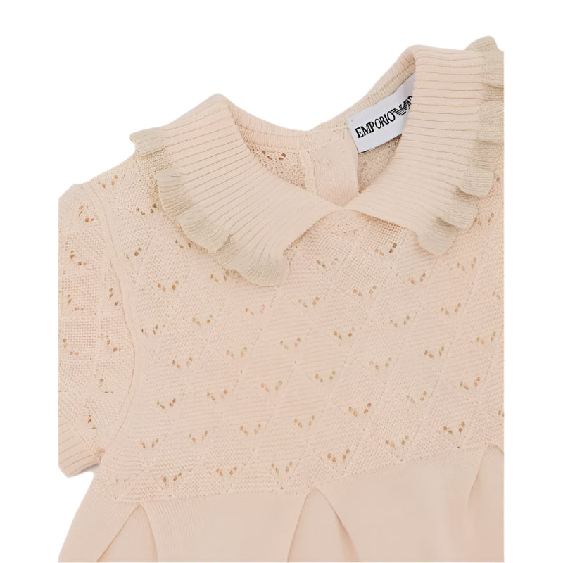 Baby girl dress set in sandshell color featuring a knitted top with a scalloped collar and textured details.
