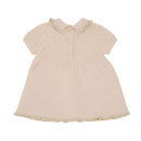 Armani baby girl dress set in sandshell color, featuring a textured knit design, short sleeves, and a buttoned back.