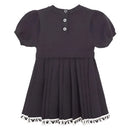 Navy short sleeve pleated dress for girls with a round neckline and button closures at the back, featuring a logo trim at the hem.