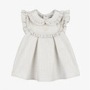 Grey dress for girls with ruffled sleeves and a collar, featuring an embroidered logo on the front.