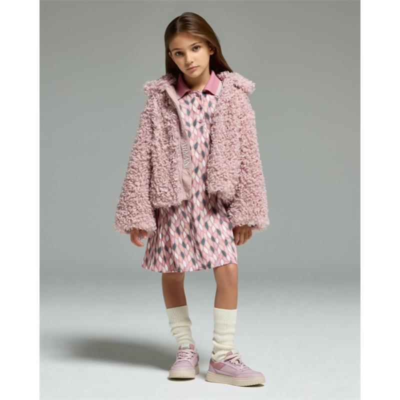 Girls short sleeve collared dress in pink with a patterned design, paired with a fluffy pink jacket and light shoes.