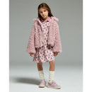 Girls short sleeve collared dress in pink with a patterned design, paired with a fluffy pink jacket and light shoes.