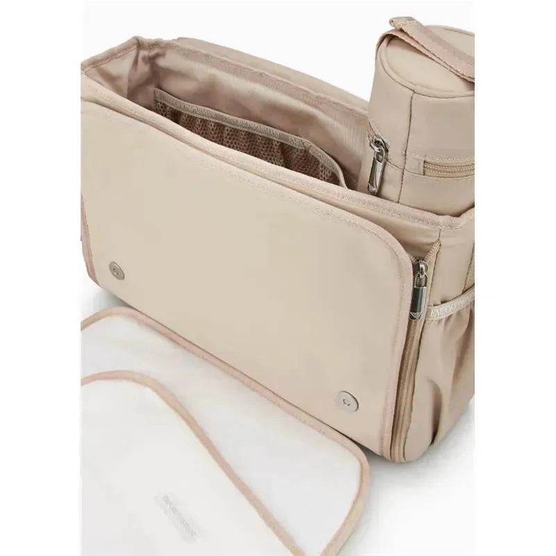 Beige Armani Baby Mummy Bag Set featuring multiple pockets, a zippered compartment, and an insulated bottle holder.
