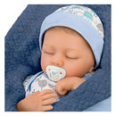Ashton Drake breathing baby boy doll swaddled in a quilted blue blanket, holding a pacifier, with a patterned hat.