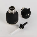 Stainless steel insulated bottle with black silicone sleeve, a cat-shaped silicone cap, and a drinking straw.
