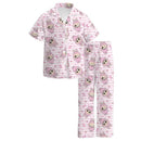 Soft pink pajama set featuring short sleeves and long pants, adorned with Labubu print and hearts.