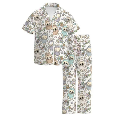 Soft and cozy short sleeve and long pants pajama set featuring a Labubu print with cartoon animals and flowers on a white background.