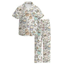 Soft and cozy short sleeve and long pants pajama set featuring a Labubu print with cartoon animals and flowers on a white background.