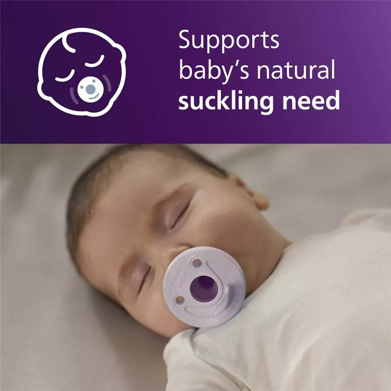 Baby peacefully sleeping with a Avent Soothie pacifier in Fresh Lilac color, highlighting support for natural suckling needs.