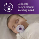 Baby peacefully sleeping with a Avent Soothie pacifier in Fresh Lilac color, highlighting support for natural suckling needs.