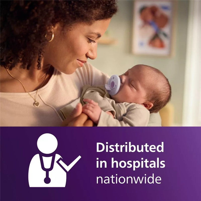 Mother holding a baby with a pacifier, featuring text about hospital distribution. The pacifier is in fresh lilac and pastel pink colors.