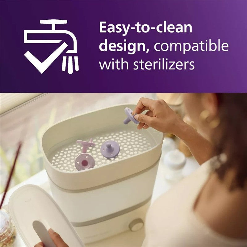 A woman places a lilac and pastel pink Soothie pacifier into a sterilizing container, promoting easy cleaning.
