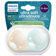Avent ultra soft pacifier set for infants 0-6 months in sand and pale mint colors, includes sterilizing case, BPA free.