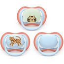 Three Avent pacifiers for ages 6-18 months, featuring leopard and sleeping tiger designs in soothing pastel colors.