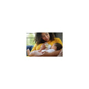 A mother in a yellow shirt feeds her baby with a blue Avent baby bottle in a cozy setting.