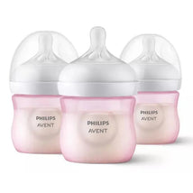 Three Philips Avent 4 oz baby bottles with natural response nipples, featuring a pink base and clear tops.