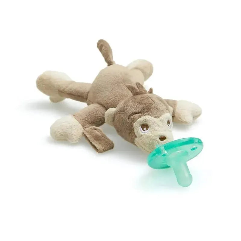 Soft plush monkey toy with a pacifier attached, designed for soothing infants, suitable from 0 months+.