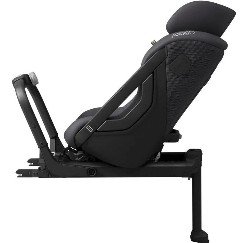 Axkid ONE 3 Extended Rear-Facing Car Seat in Arctic Mist Grey, shown at a side angle with adjustable recline feature.