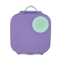 Square lilac lunchbox with a mint green circular lid detail, featuring a handle for easy carrying.