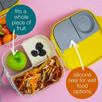 Mini Lunchbox in strawberry shake color, featuring sections for a whole apple, yogurt, blackberries, and noodles, with silicone seal noted.