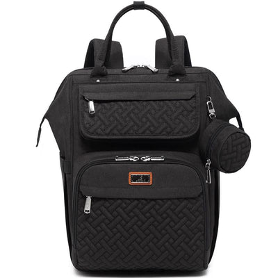 Black diaper bag backpack with textured exterior, multiple zippered compartments, and a round detachable pouch.