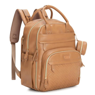 Light brown vegan leather diaper bag with multiple zippers, pockets, and a side pouch for convenience.