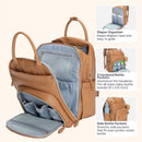 Light brown vegan leather diaper bag with multiple pockets, including a diaper organizer and insulated bottle compartments.