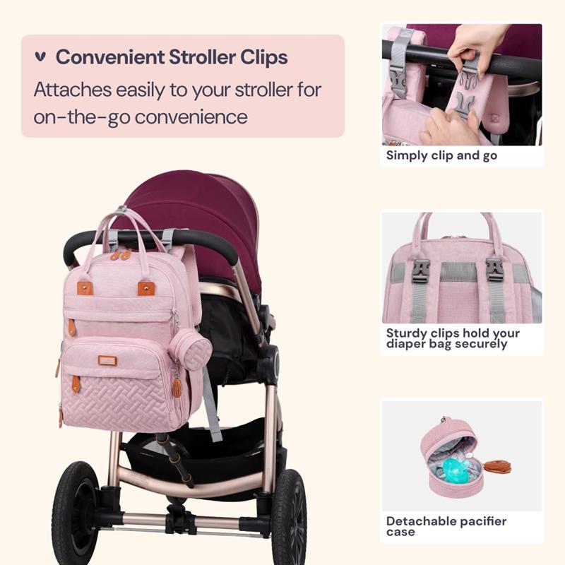 Pink BabbleRoo travel tote bag with stroller clips shown attached to a stroller, featuring zippered compartments and a detachable pacifier case.