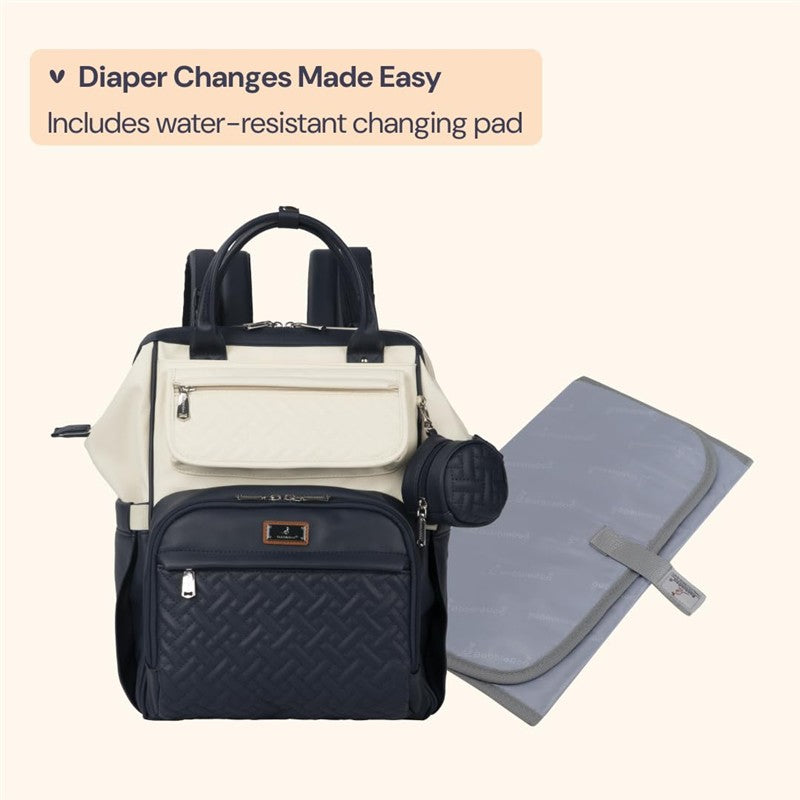 Vegan leather diaper bag backpack in blueberry cream with a water-resistant changing pad, featuring multiple pockets and a sleek design.