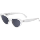 Children’s cat-eye UV sunglasses in white with dark lenses, featuring Babiators branding on the side.