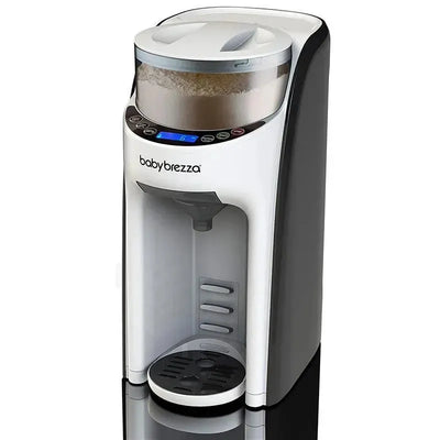 Baby Brezza Baby Formula Pro Advance machine for automated formula preparation, featuring a digital display and dispensing spout.