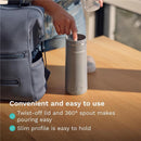 Portable Baby Brezza bottle warmer in sleek black with a twist-off lid, 360° spout, and easy-hold slim profile.