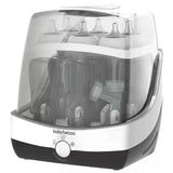 Baby Brezza Superfast Sterilizer Dryer, featuring transparent chamber holding multiple baby bottles and accessories.
