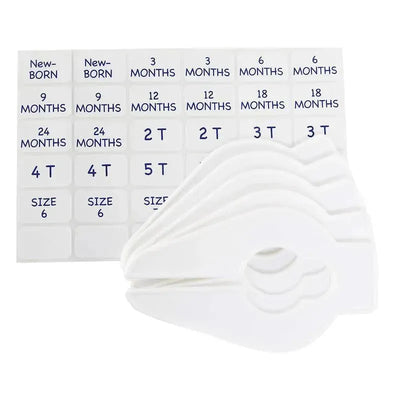 Five white size labels and a sheet of tags displaying infant and toddler clothing sizes for organization.