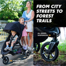 Baby Jogger City Mini GT3 All Terrain Stroller in Sierra Sand, featuring a child sitting inside and details on its wheels and suspension.