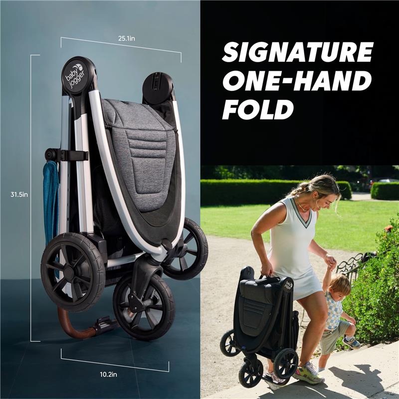 Baby Jogger City Mini GT3 stroller in Sierra Sand, folded for easy transport, with a woman carrying it and holding a child.