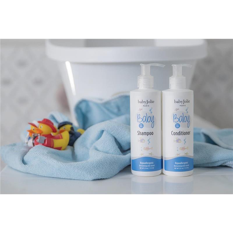 Baby Jolie bath set includes shampoo and conditioner bottles on a blue towel, with rubber ducks in the background.