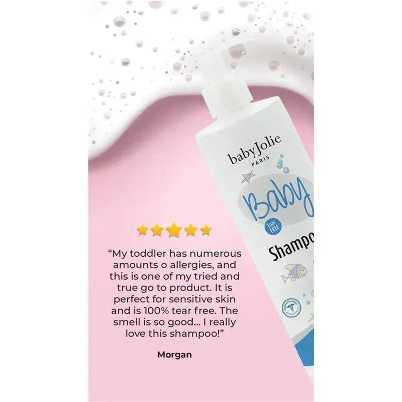 Baby Jolie Tear Free Baby Shampoo bottle on a pink background with bubbles and a review praising its effectiveness for sensitive skin.