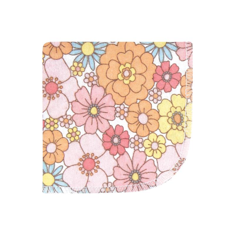 Flannel washcloth featuring a vibrant floral pattern with pink, orange, and blue flowers, ideal for baby use.