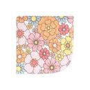 Flannel washcloth featuring a vibrant floral pattern with pink, orange, and blue flowers, ideal for baby use.